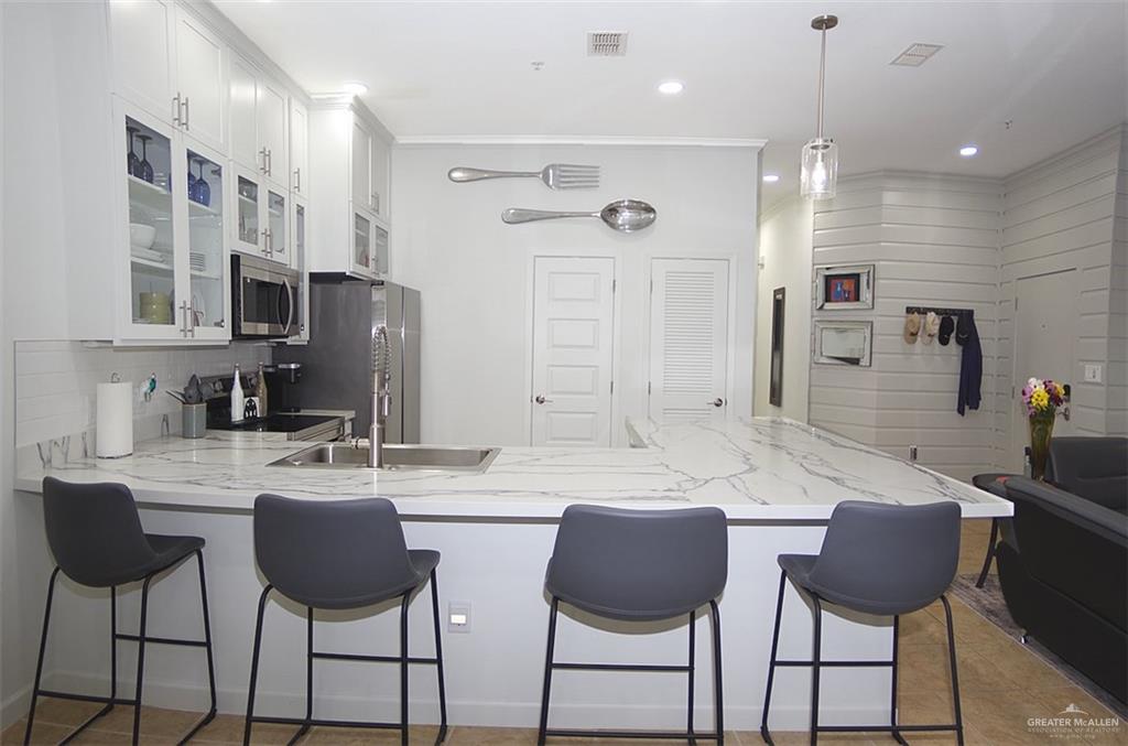Photo 11 of 6410 Padre Boulevard #102